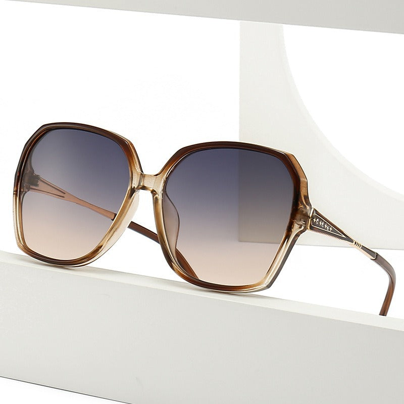 Penelope Sunglasses in Brown — Women's oversized hex acetate sunglasses with rose-gold temple detail