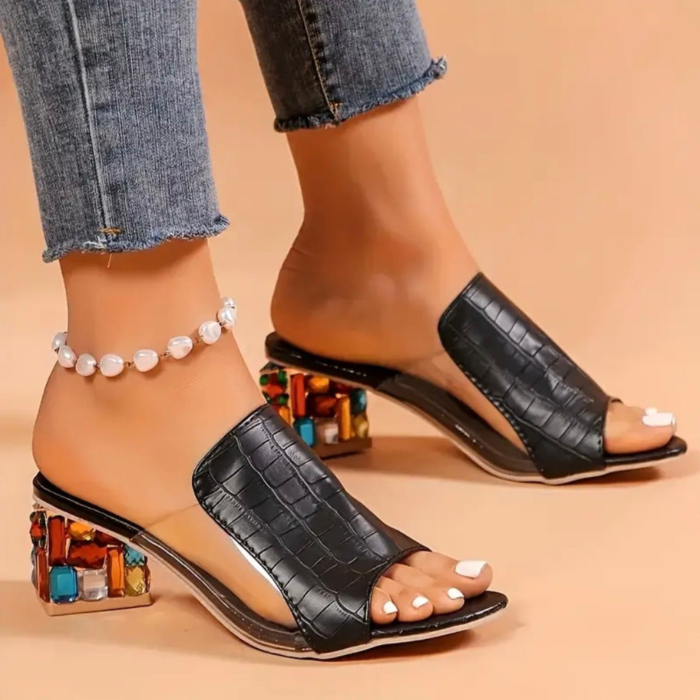 Lucia Gemstone Heels in Black on model — jeweled clear block heel mule
