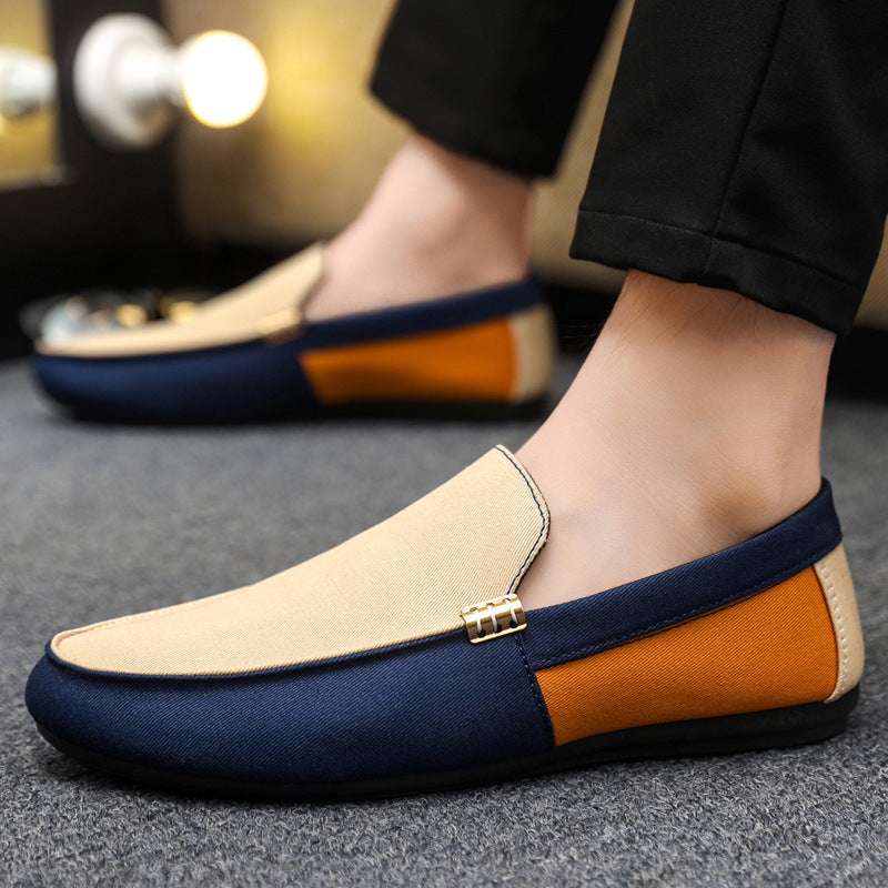 Enzo Canvas Loafers in Beige — worn on foot