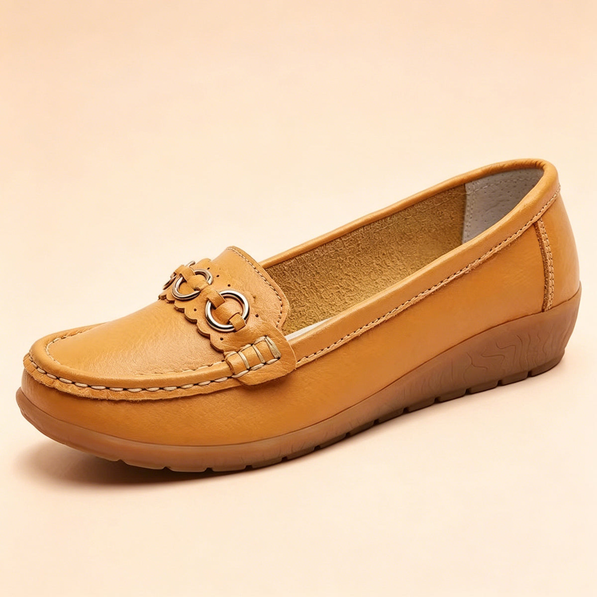 Nella Wedge Loafers in Light Brown — side view of the leather upper and low wedge sole