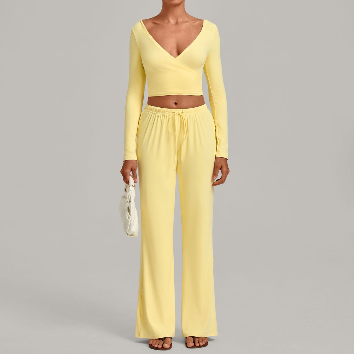 Julia Active Set in Yellow — cropped long-sleeve wrap top with matching wide-leg drawstring pants