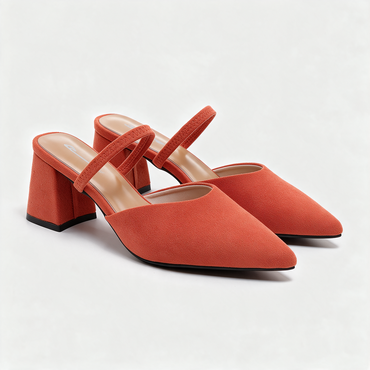 Chloe Pointed Mules in Dark Orange — pointed-toe suede mules on a flared block heel