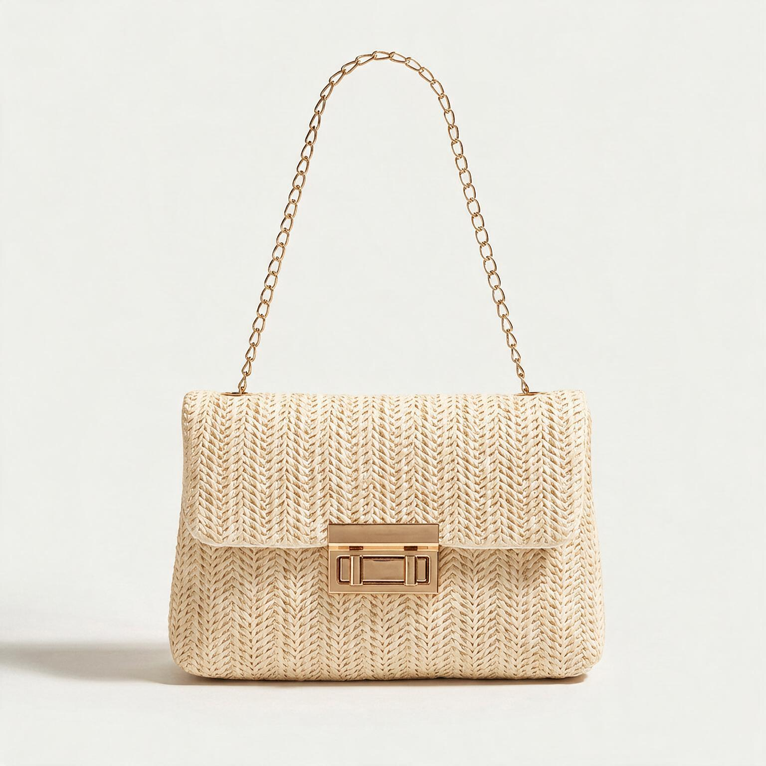 Sienna Woven Handbag — woven straw crossbody with gold chain strap