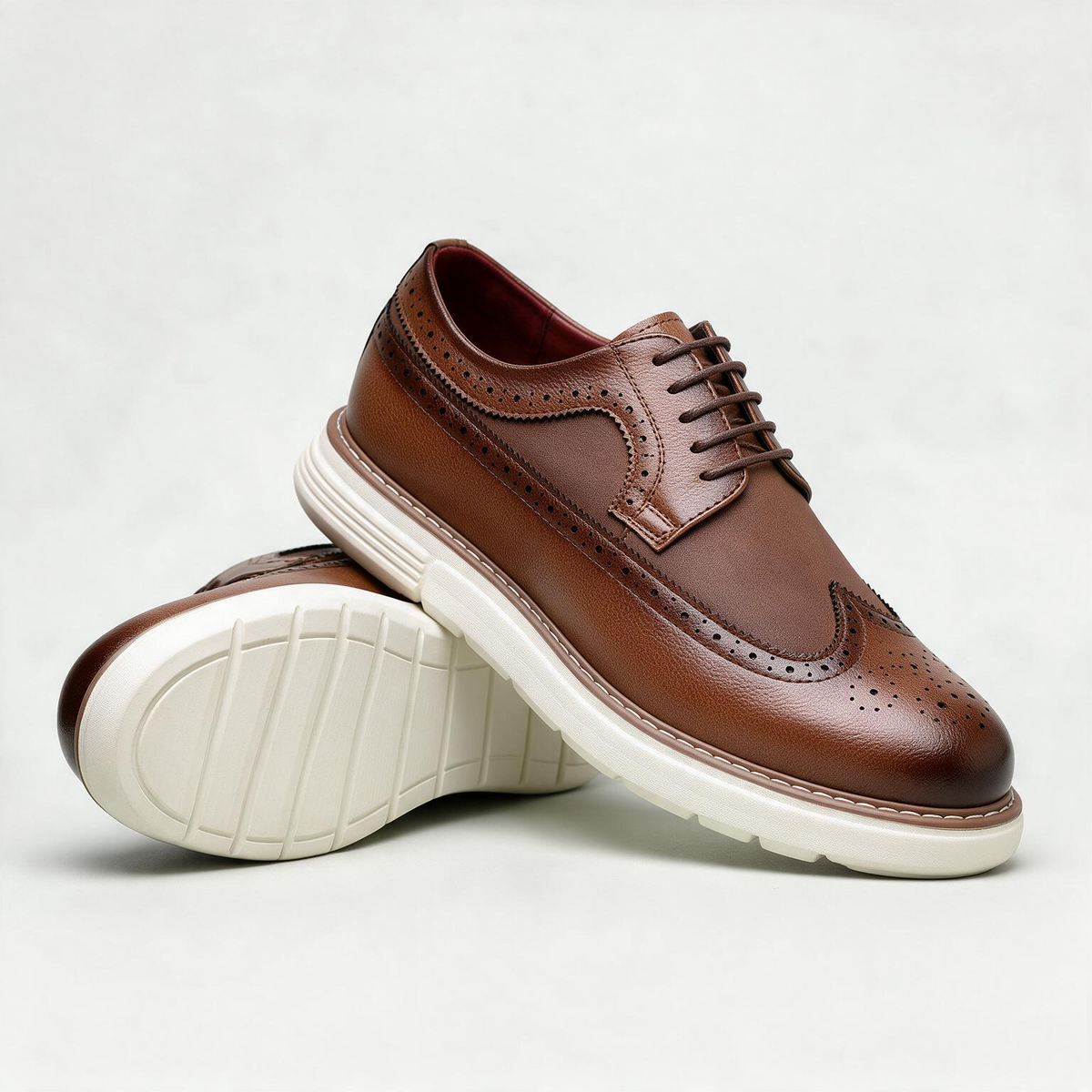 Cassian Brogue Sneakers — men's leather wingtip brogues on a white sneaker sole