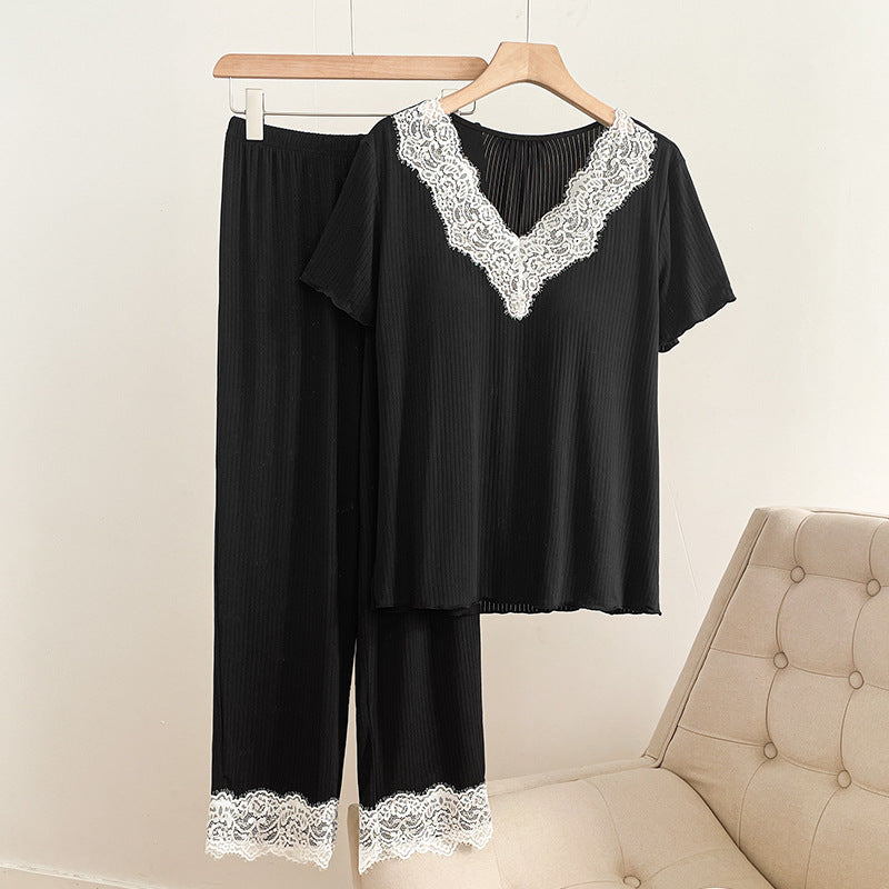 Delia Pajama Set in Black — ribbed knit top and pants with white lace trim