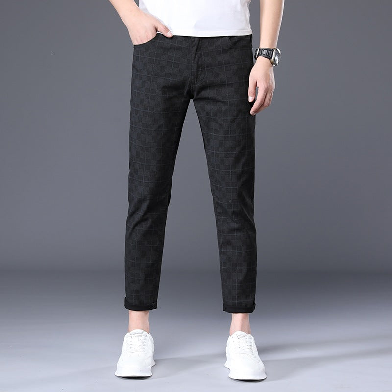 Romano Plaid Trousers in Black — slim-fit checked stretch cotton trousers