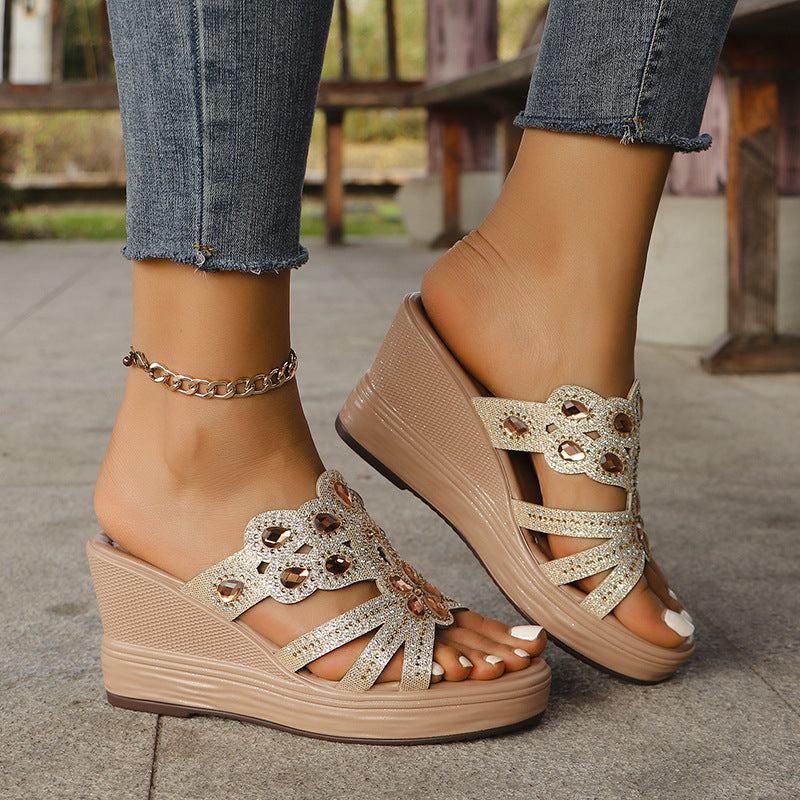 Livia Crystal Sandals in Gold — rhinestone wedge slide with jeweled floral centerpiece