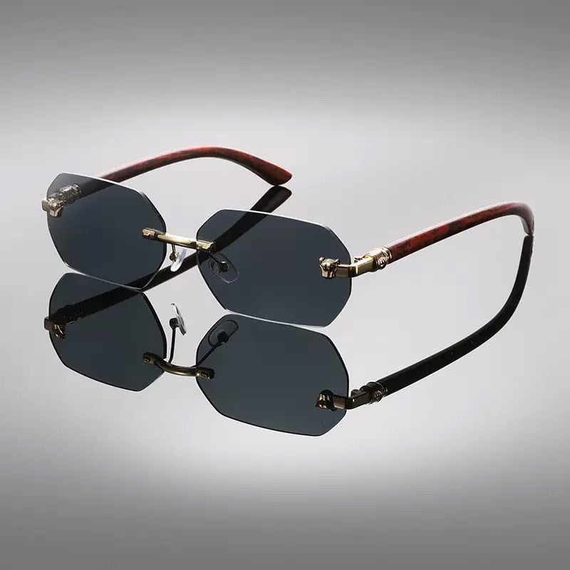 Dax Rimless Sunglasses in Black — faceted rimless lenses with gold leopard temples