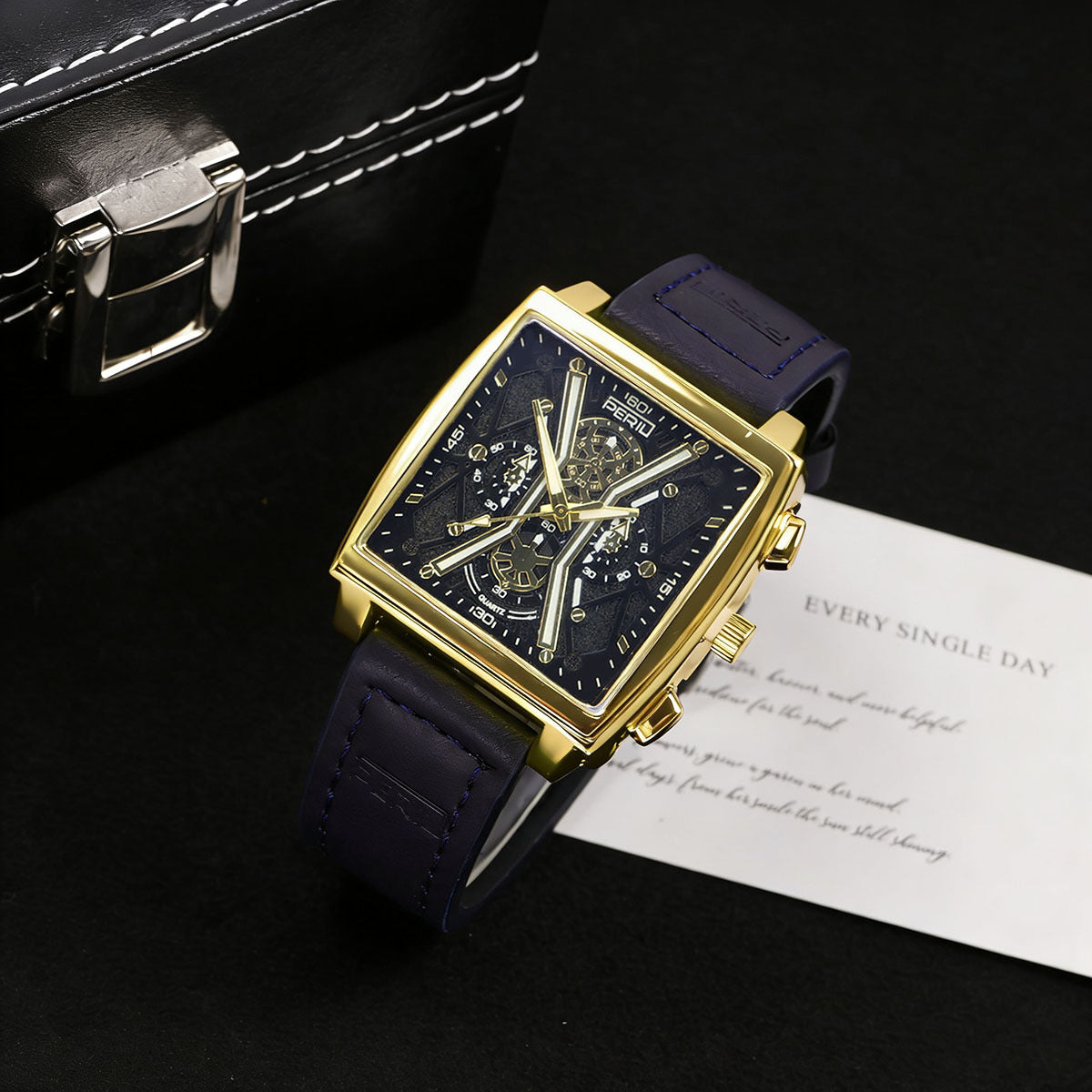 Sinclair Skeleton Watch in Navy Blue — gold square case with navy blue stitched leather strap