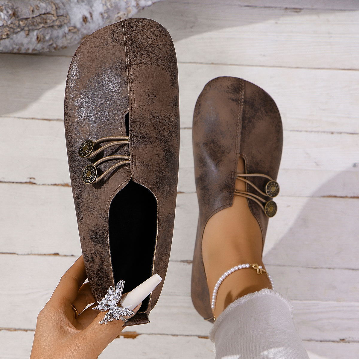 Juliette Slip-On Flats in Brown — buttery-soft leather flats with twin-button detail