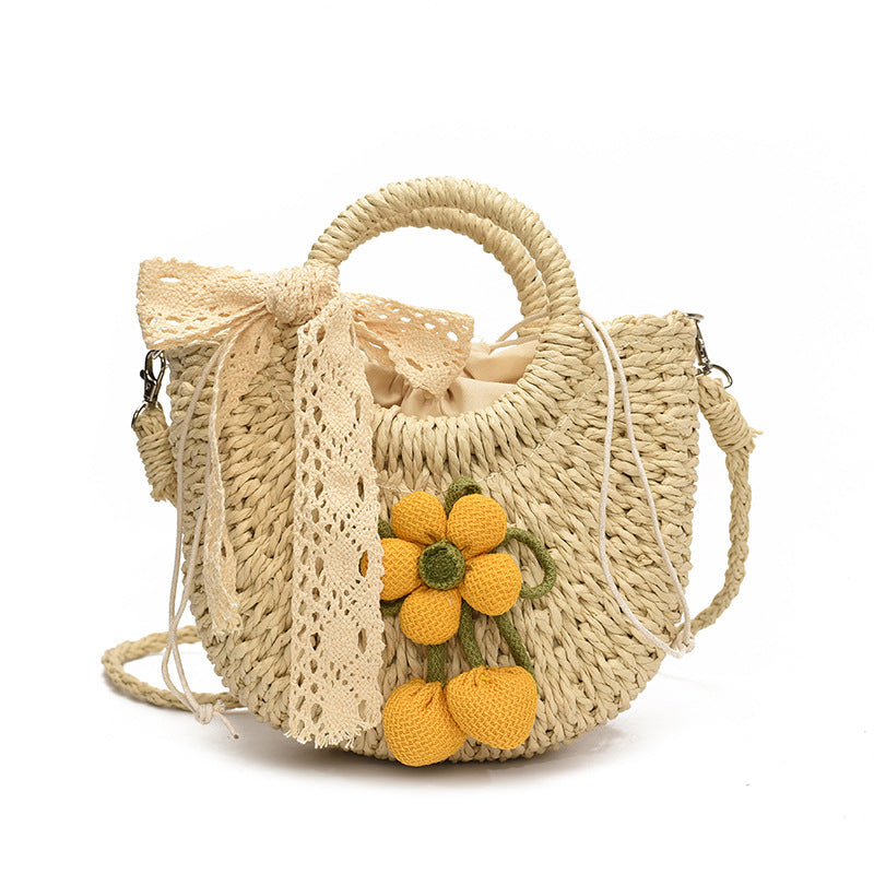 Noemi Straw Bag in Yellow — woven straw handbag with lace bow
