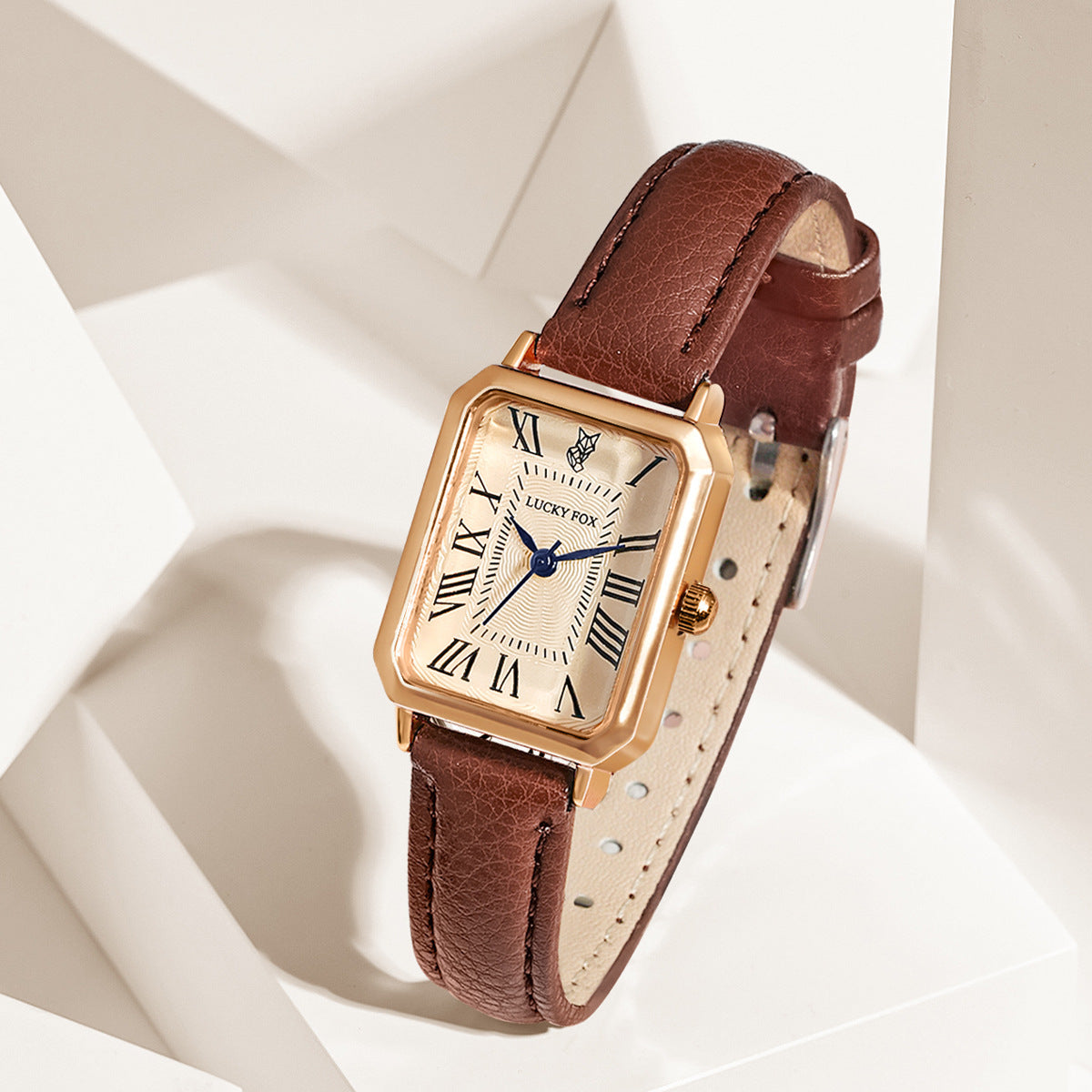 Juliette Vintage Watch in Brown — gold-tone rectangle watch with cream Roman-numeral dial
