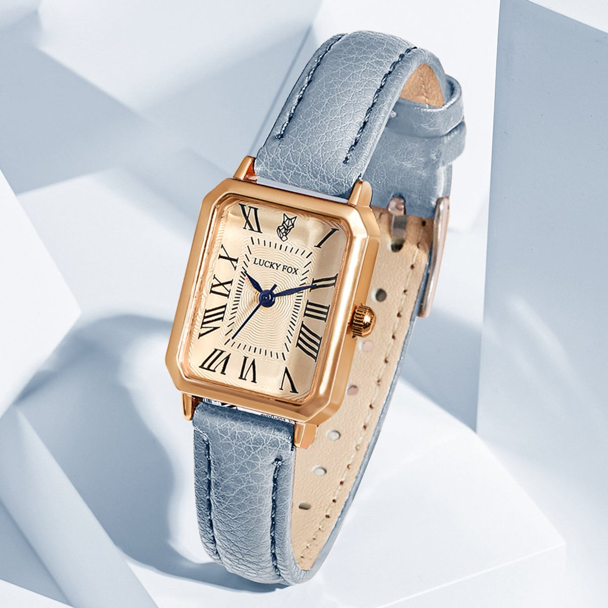 Juliette Vintage Watch in Light Blue — gold-tone rectangle watch with cream Roman-numeral dial