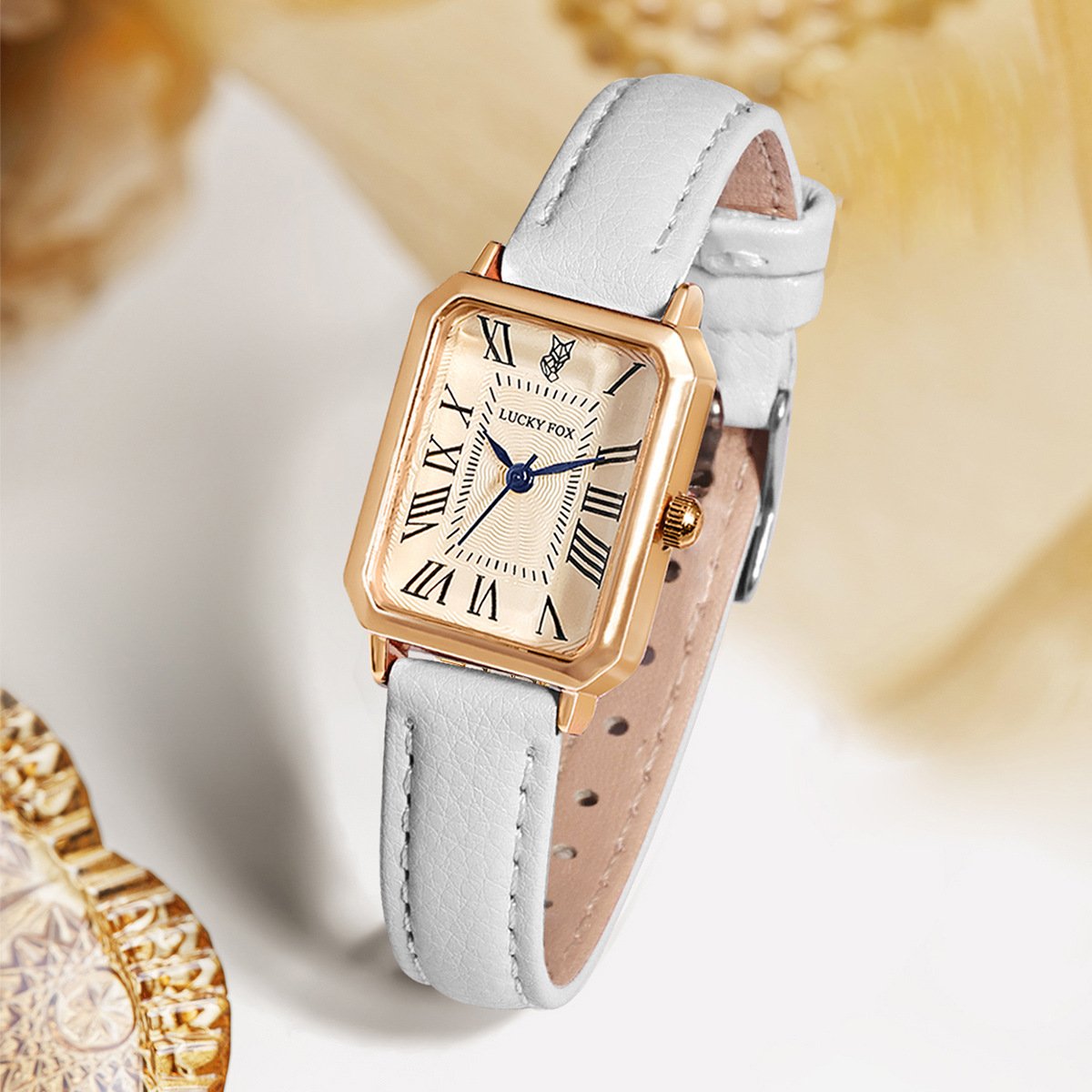 Juliette Vintage Watch in White — gold-tone rectangle watch with cream Roman-numeral dial