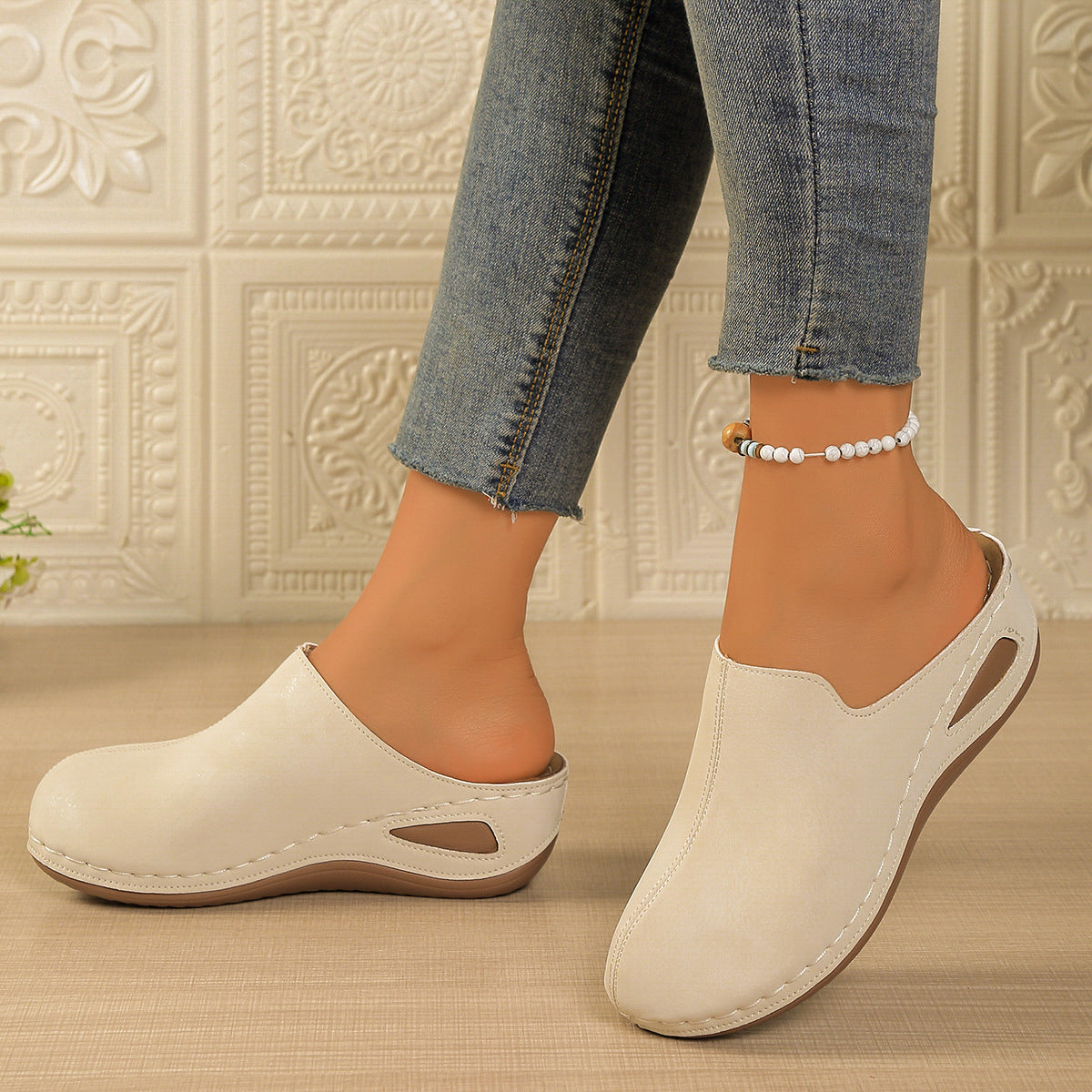 Nia Suede Mules in Brown — slip-on wedge mule with cushioned footbed