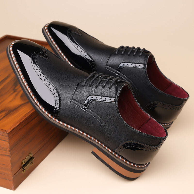 Spencer Brogue Sneakers in Black — side profile showing the low stacked heel