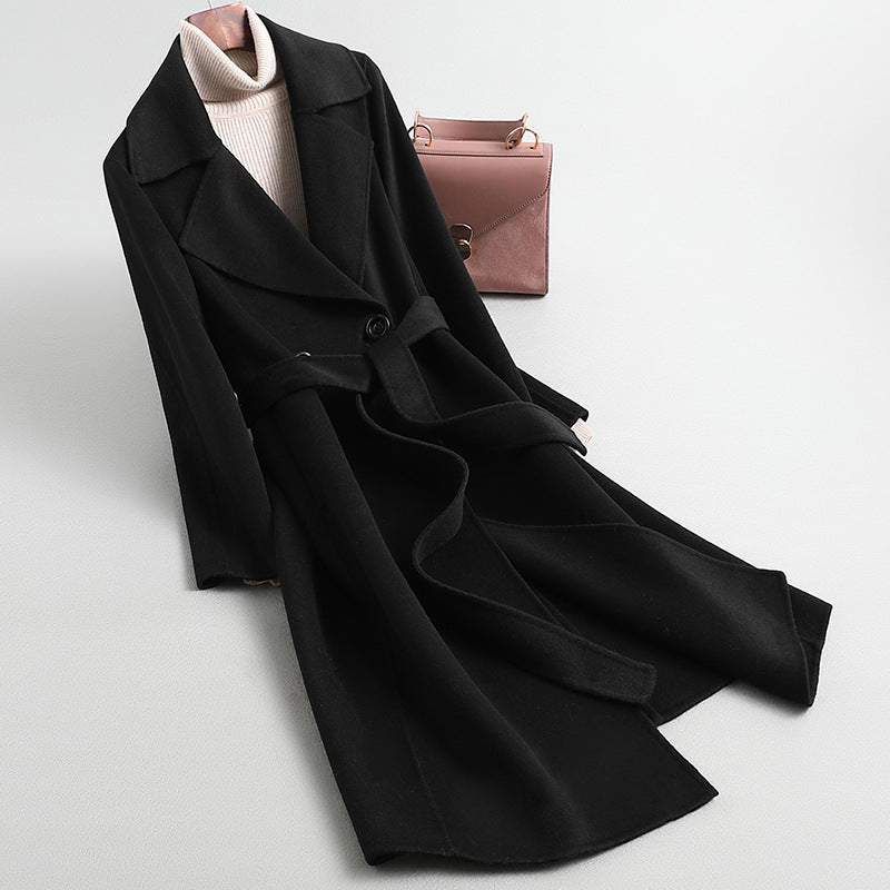Odette Belted Coat in Black — long wool wrap coat with notched lapel and self-tie belt